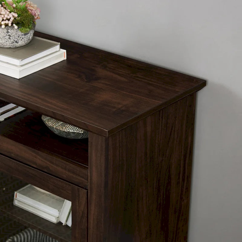 Meuble TV moderne avec porte vitrée et rangements ouverts et fermés pour téléviseurs jusqu'à 65 pouces