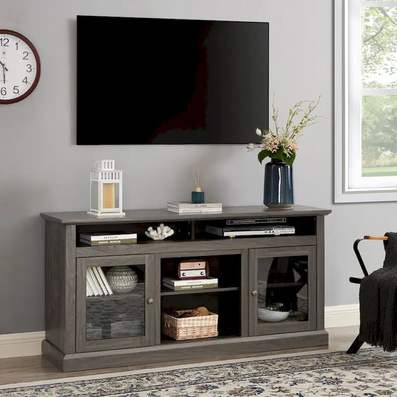 Meuble TV moderne avec porte vitrée et rangements ouverts et fermés pour téléviseurs jusqu'à 65 pouces